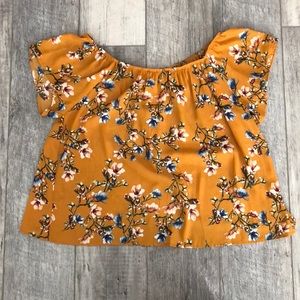 Off the shoulder, open back top